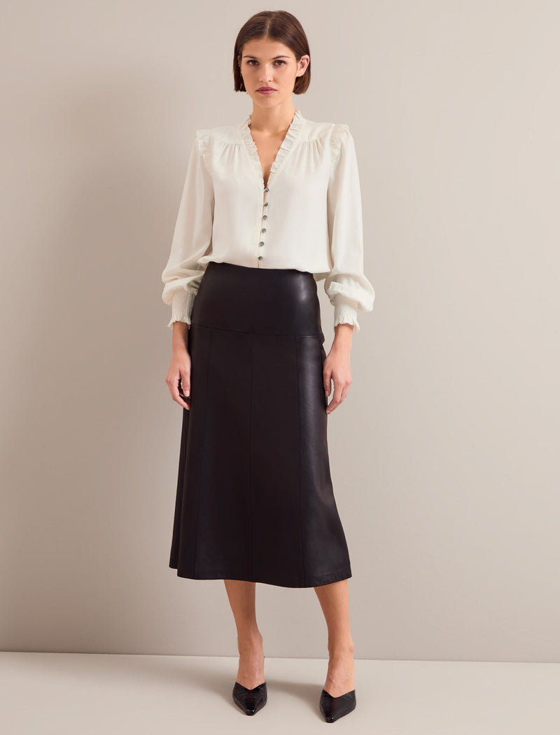 The Versatility of the Black Leather Midi Skirt