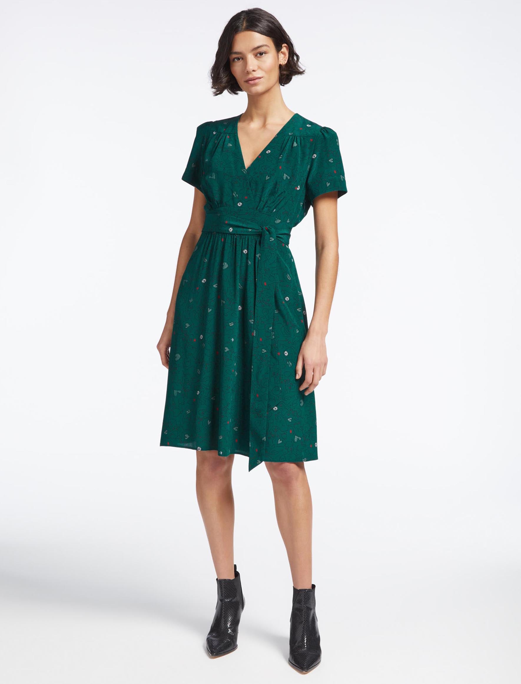 Gina Silk Knee Length Fixed Wrap V Neck Dress with Wide Belt in Dark Green Lips Eyes Print